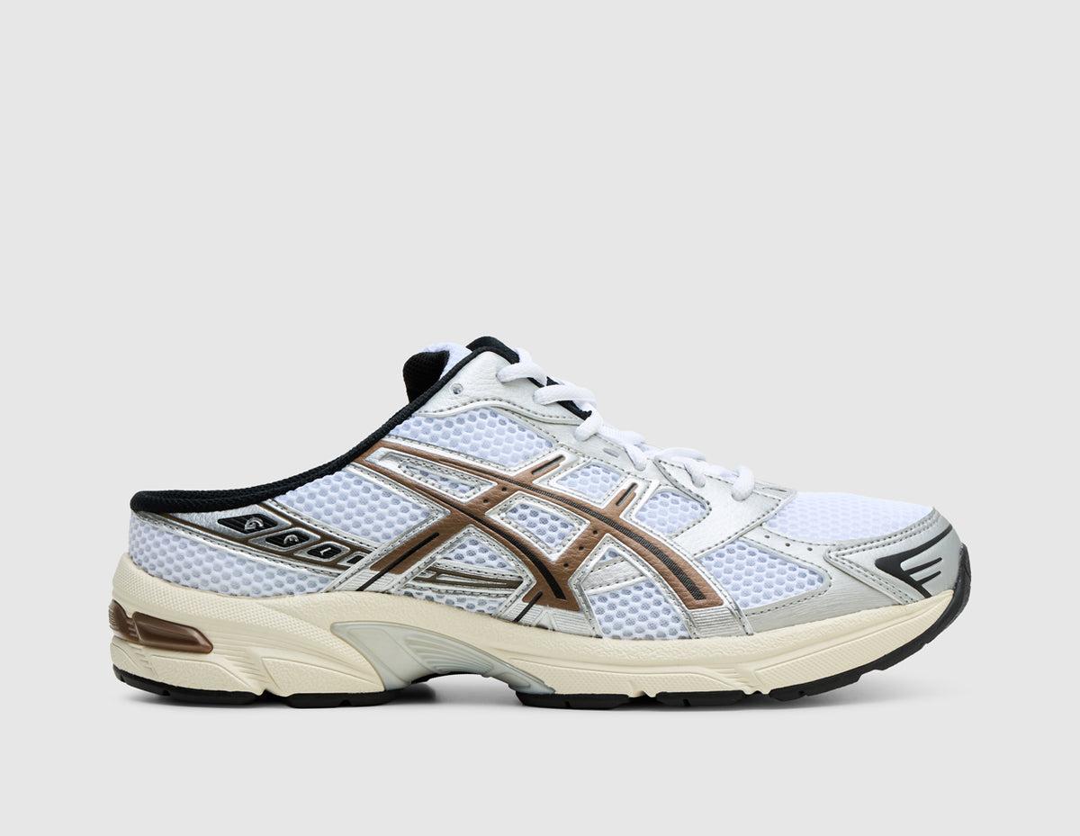 ASICS GEL-1130 Mule. Side view of white open-back mule sneakers with metallic silver and clay canyon overlays and GEL cushioned sole. 