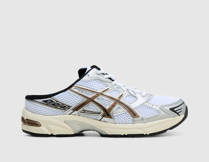 ASICS GEL-1130 Mule. Side view of white open-back mule sneakers with metallic silver and clay canyon overlays and GEL cushioned sole. 