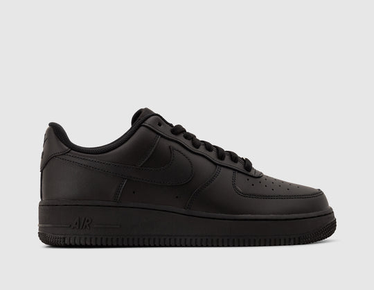 Nike Air Force 1 '07. Side view of all-black leather sneakers showing tonal Nike Swoosh and AIR branded midsole. 