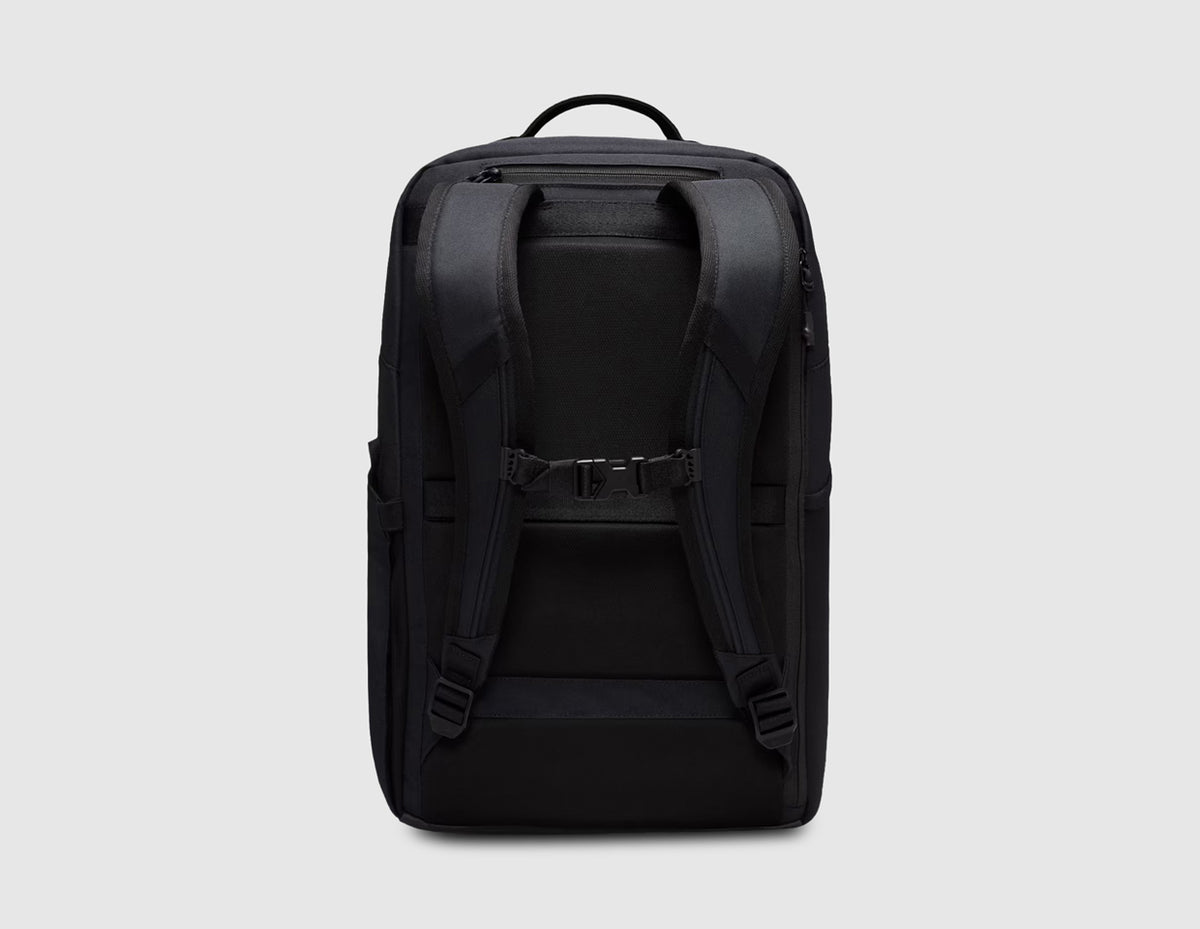 Nike Utility Speed Backpack (27L). Back view showing padded black back panel with Max Air cushioning inserts, adjustable padded shoulder straps with sternum strap, and top carrying loop. 