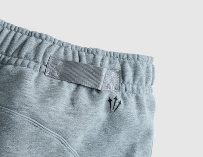 Nike NOCTA Cardinal Fleece Sweatpants Dark Heather Grey / Black