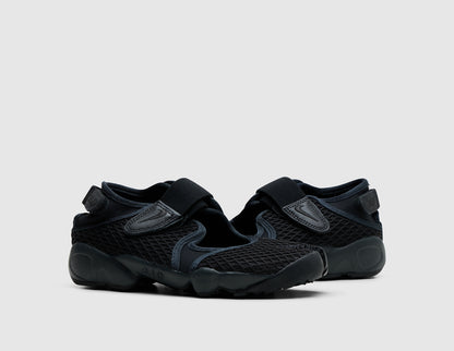 Nike Women's Air Rift. Three-quarter view of pair of off-noir black split-toe mesh shoes showing adjustable midfoot straps. 