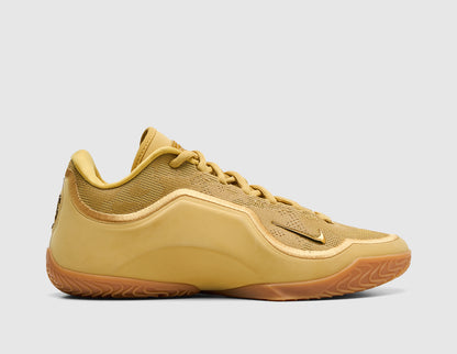 Nike LeBron XXIII "Honor Society". Side view of wheat gold basketball shoes showing small forefoot Swoosh and gum rubber outsole. 