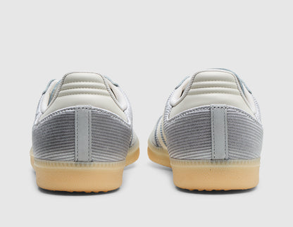 adidas Originals Samba OG. Rear view of pair of grey two sneakers showing chalk white leather heel tabs and gum rubber midsoles. 