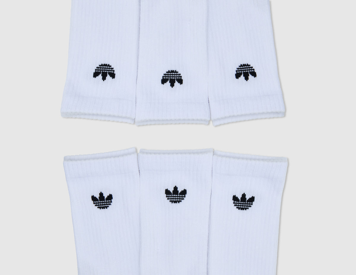 adidas Originals Trefoil 2.0 Crew Socks (6-Pack). Close-up top-down view of the ribbed upper cuffs arranged in two opposing rows, showing the jacquard knit black adidas Trefoil logos. 