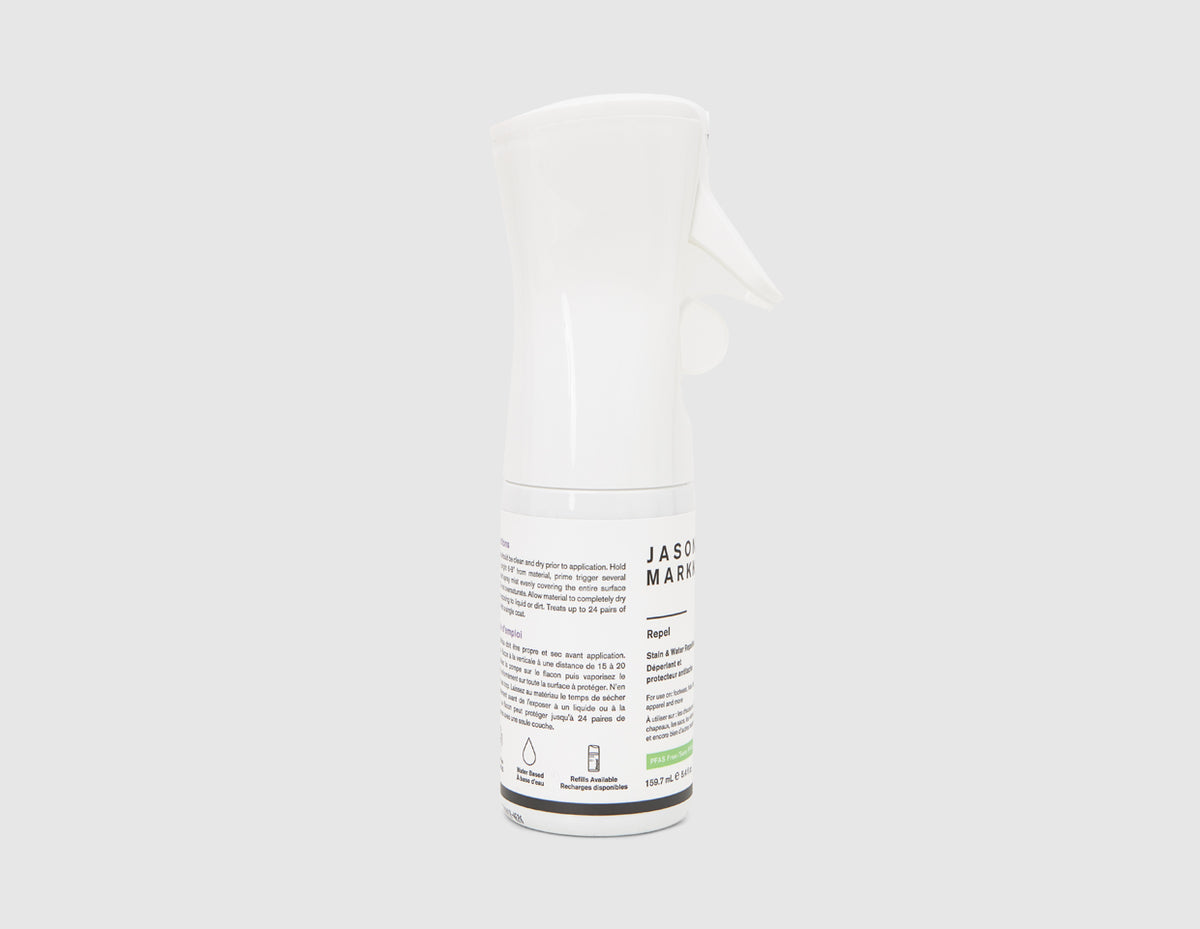 Jason Markk 5.4 oz. Repel Spray. Side view of white spray bottle showing product instructions and ingredient details. 