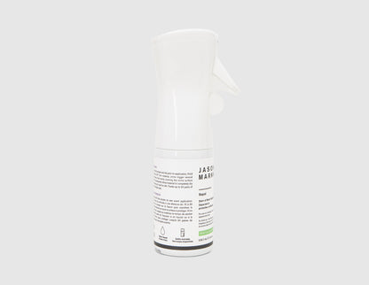 Jason Markk 5.4 oz. Repel Spray. Side view of white spray bottle showing product instructions and ingredient details. 