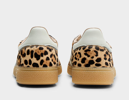 adidas Women's Handball Spezial. Rear view of leopard print sneakers showing white leather heel tabs and gum rubber midsoles. 