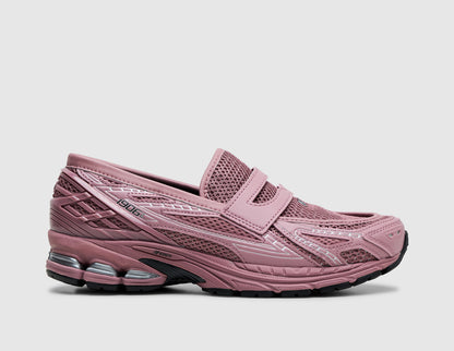 New Balance 1906L. Side view of rosewood pink mesh and leather loafer hybrid featuring penny loafer strap, TPU heel cage, and N-ergy cushioned sole. 