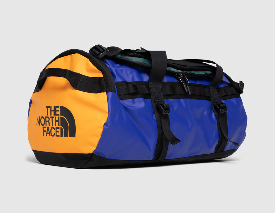 Orange north face duffel bag discount