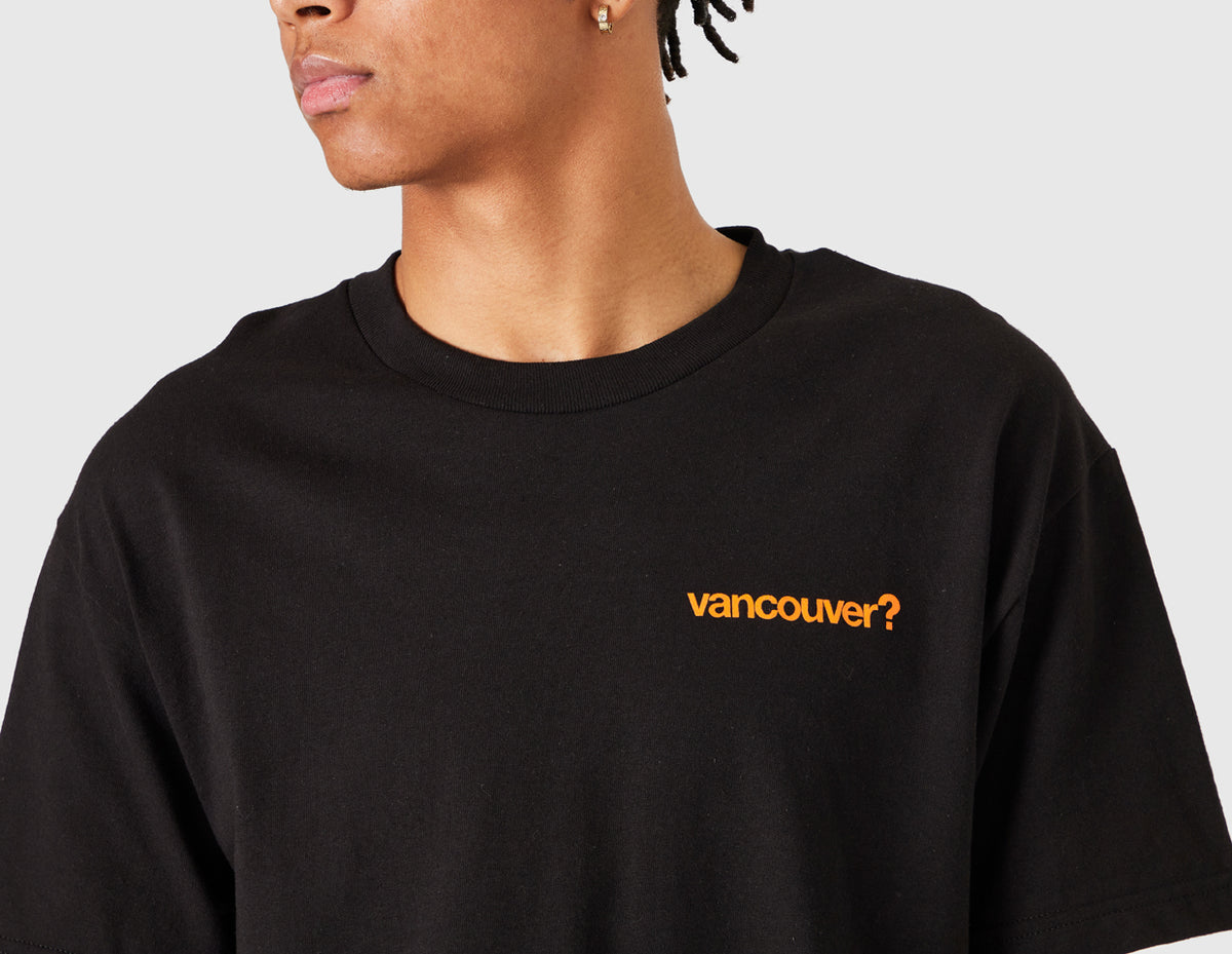 size? Vancouver Logo T-Shirt. Close-up model view of male model showing orange printed "vancouver?" logo on left chest and ribbed crewneck collar. 