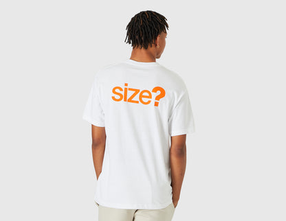 size? Vancouver Logo T-Shirt. Rear model view showing male model in white t-shirt featuring large orange printed "size?" graphic across the back shoulders. 